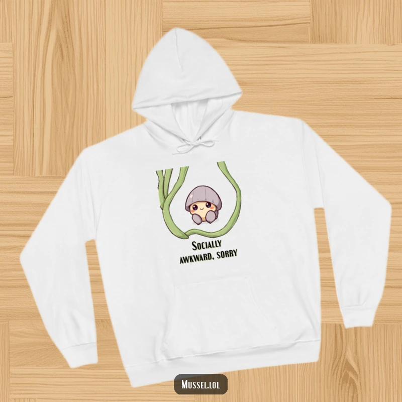 Funny hoodie featuring a shy mussel character peeking out from under a seaweed frond, perfect for cozying up.