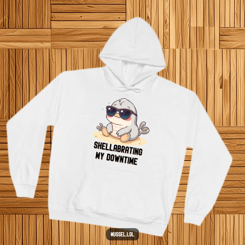 Funny Mussel Hoodie: A mussel in sunglasses lounges on a beach, offering warmth and a cool, carefree attitude.